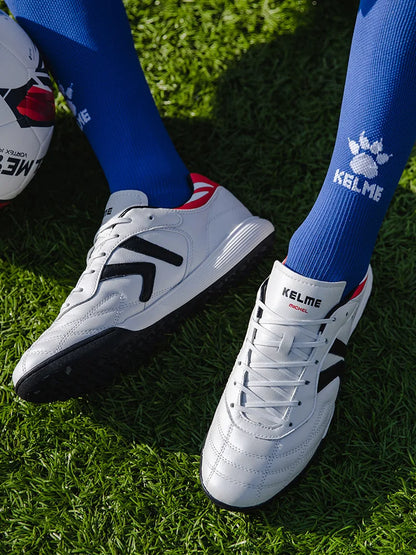 KELME nogometni čevlji TF nogometni čevlji iz telečje kože s špicami profesionalni futsal originalni nogometni trening čevlji ZX80011017