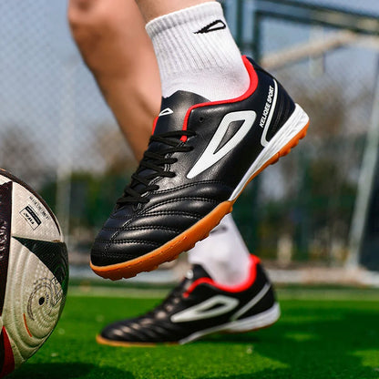 Najbolje prodajani unisex nogometni čevlji za mlade s špicami za umetno travo, protizdrsni, z dihalnim usnjenim zgornjim delom, lahki in trpežni za nogometni trening