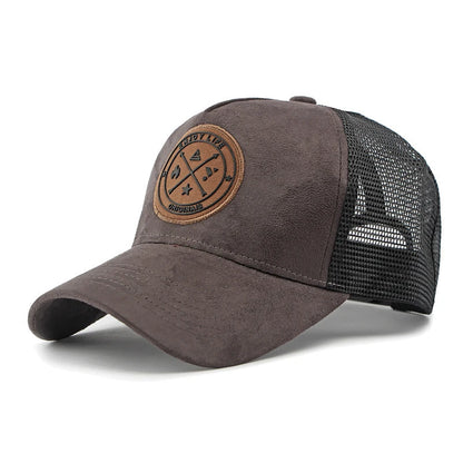 A retro-style suede work cap with a leather logo and breathable mesh design, suitable for both men and women to wear casually.