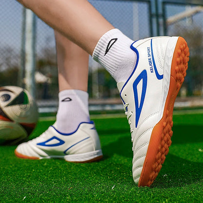 Najbolje prodajani unisex nogometni čevlji za mlade s špicami za umetno travo, protizdrsni, z dihalnim usnjenim zgornjim delom, lahki in trpežni za nogometni trening