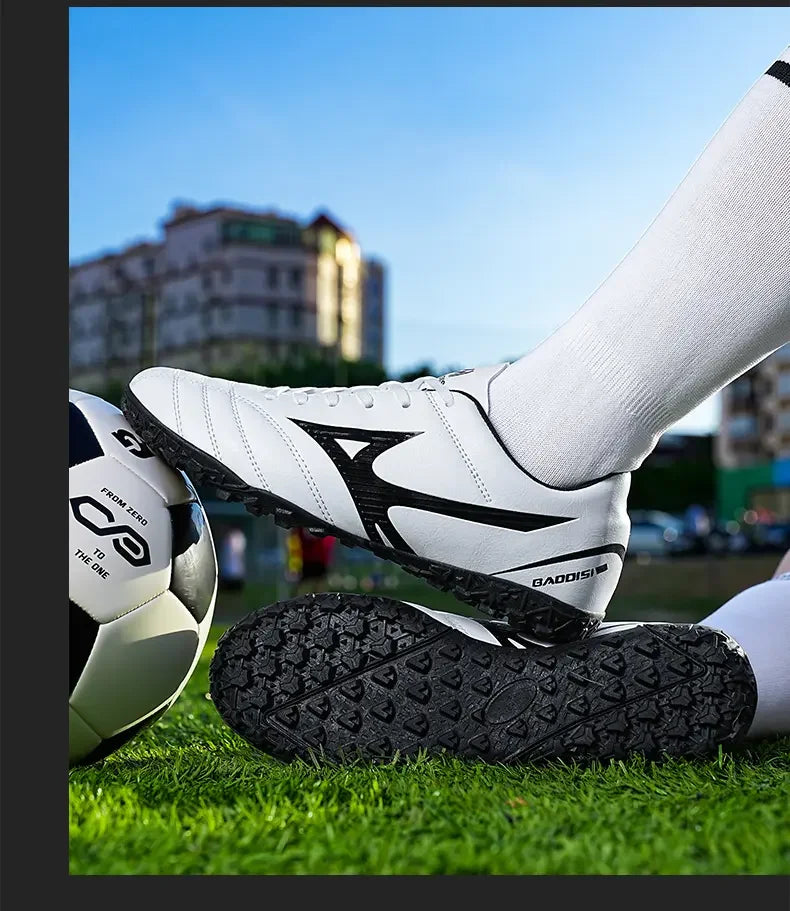 Scarpe da calcio con pulsanti principali e tacchetti lunghi spezzati - Scarpe da calcio per sport all'aperto